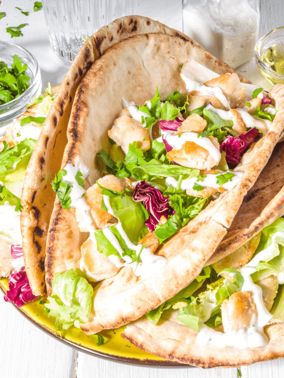 The Ultimate Vegan Donner Kebab: Jackfruit “Meat,” Fresh Salad Greens, and Creamy Plant Based Sauce.